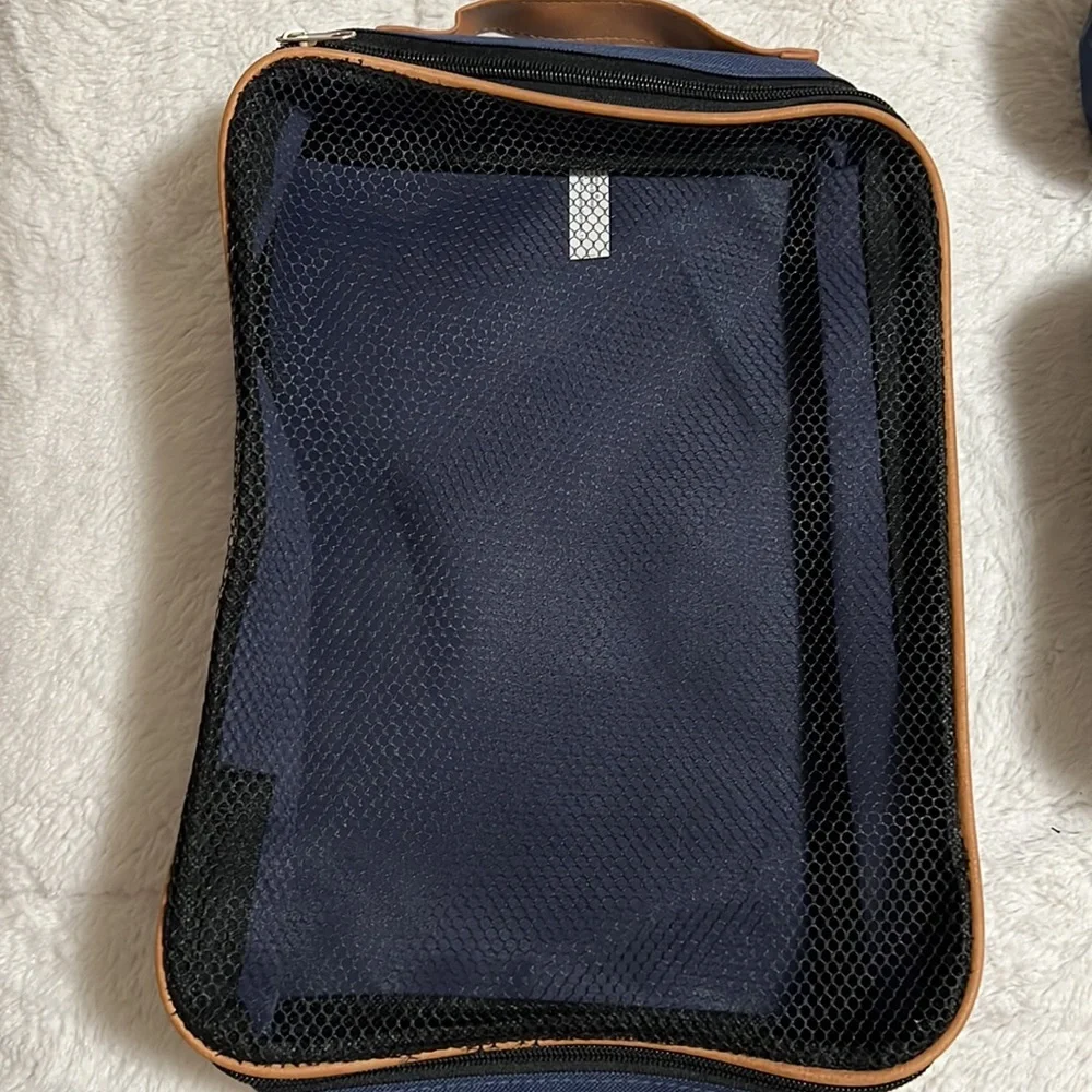 Source Unknown inches bags by